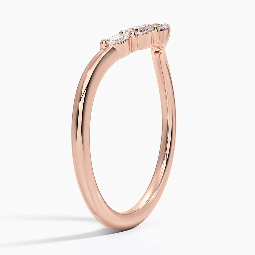 Side profile view of rose gold contoured moissanite stacking ring
