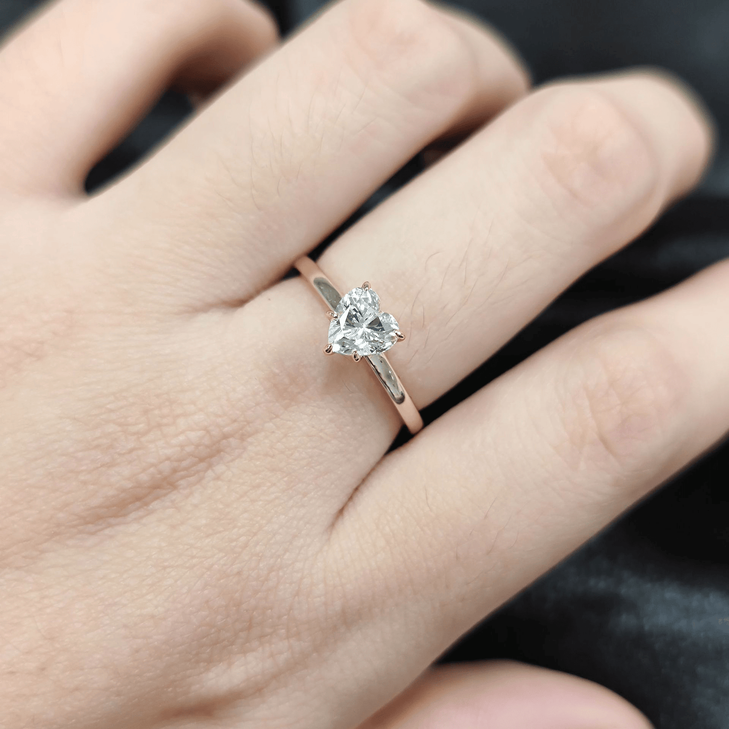 Heart Cut Moissanite Solitaire Engagement Ring with 3 Prong Setting in Yellow Gold on hand styling - Novelle Vow