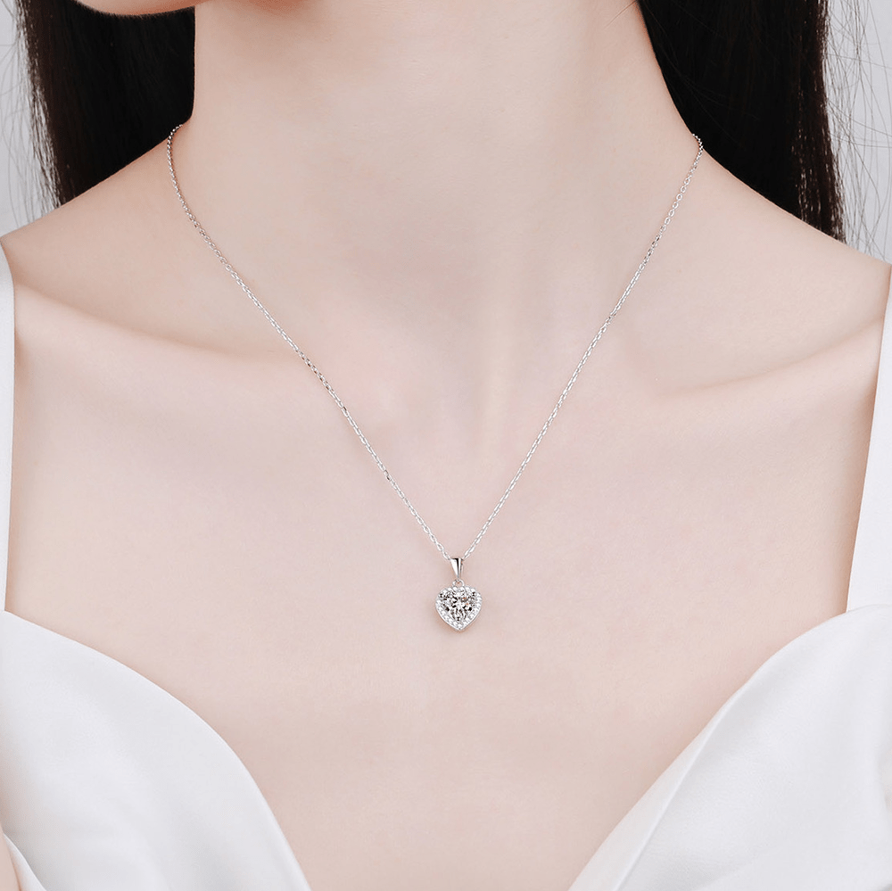 Heart - Shaped Moissanite Halo Pendant Necklace Worn on Model in Sterling Silver - Novelle Vow