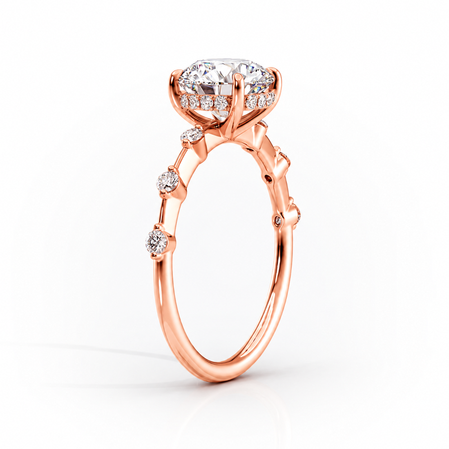 Rose gold marquise cut moissanite engagement ring 3/4 side perspective view showing bubble station band