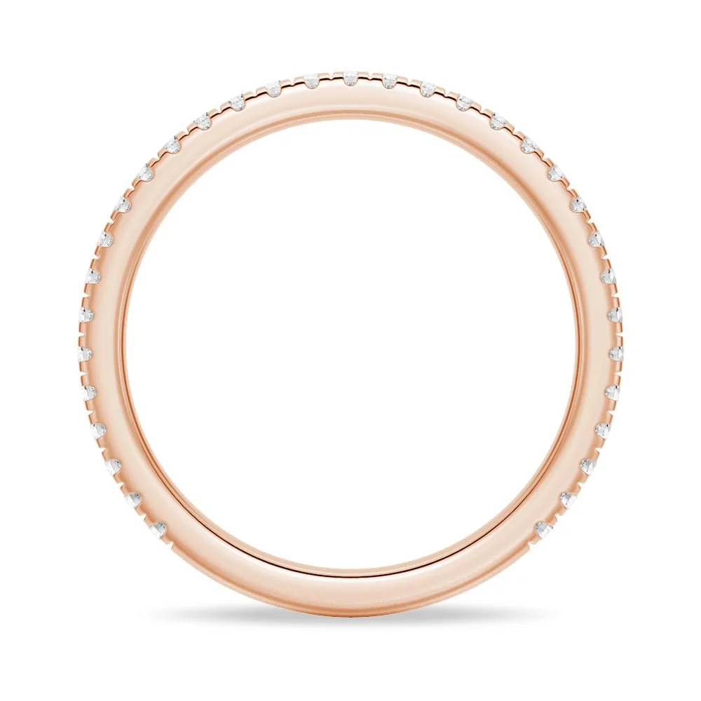 Full ring profile view of round moissanite pave wedding band in rose gold