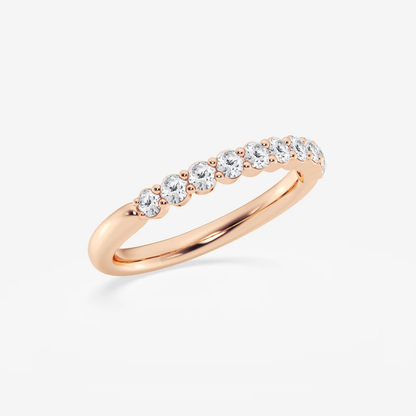 Three-quarter perspective view of round moissanite shared-prong wedding ring in rose gold