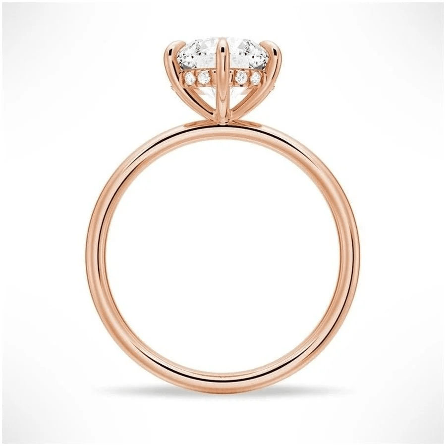 Profile view of 6 Prong Round Moissanite Engagement Ring with Hidden Halo detail in Rose Gold
