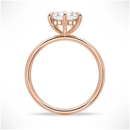 Profile view of 6 Prong Round Moissanite Engagement Ring with Hidden Halo detail in Rose Gold
