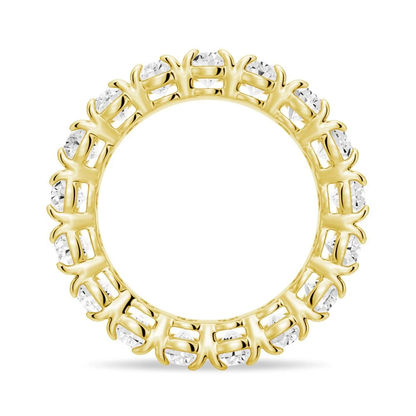 Side circular profile view of yellow gold oval cut moissanite ring