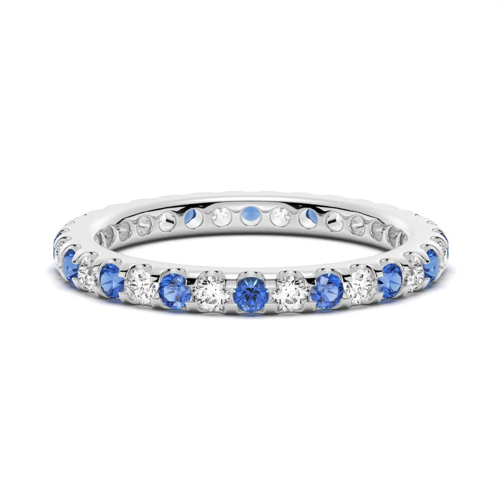 NOVELLE VOW perspective side angle view of alternating blue and white sapphire eternity band in white gold
