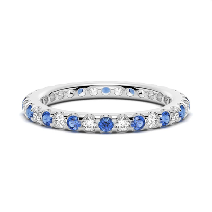NOVELLE VOW perspective side angle view of alternating blue and white sapphire eternity band in white gold