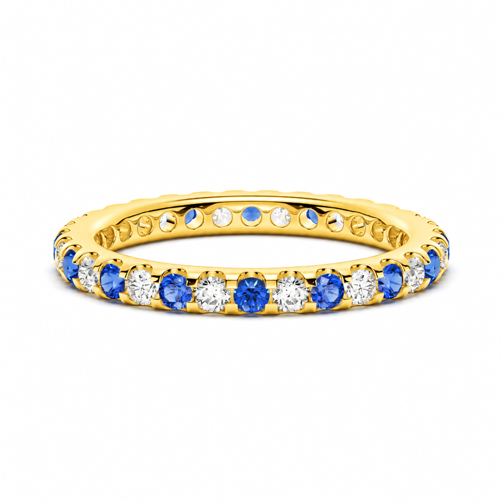 Front view of 2.6mm alternating round blue and white sapphire U-prong eternity band in yellow gold