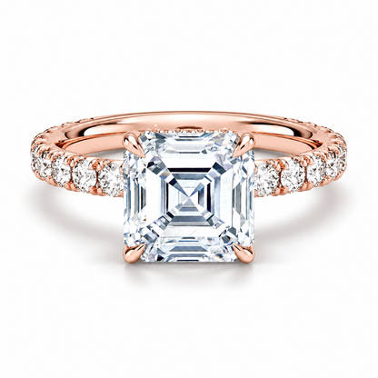 Rose gold asscher cut moissanite engagement ring top view with French pave diamond band