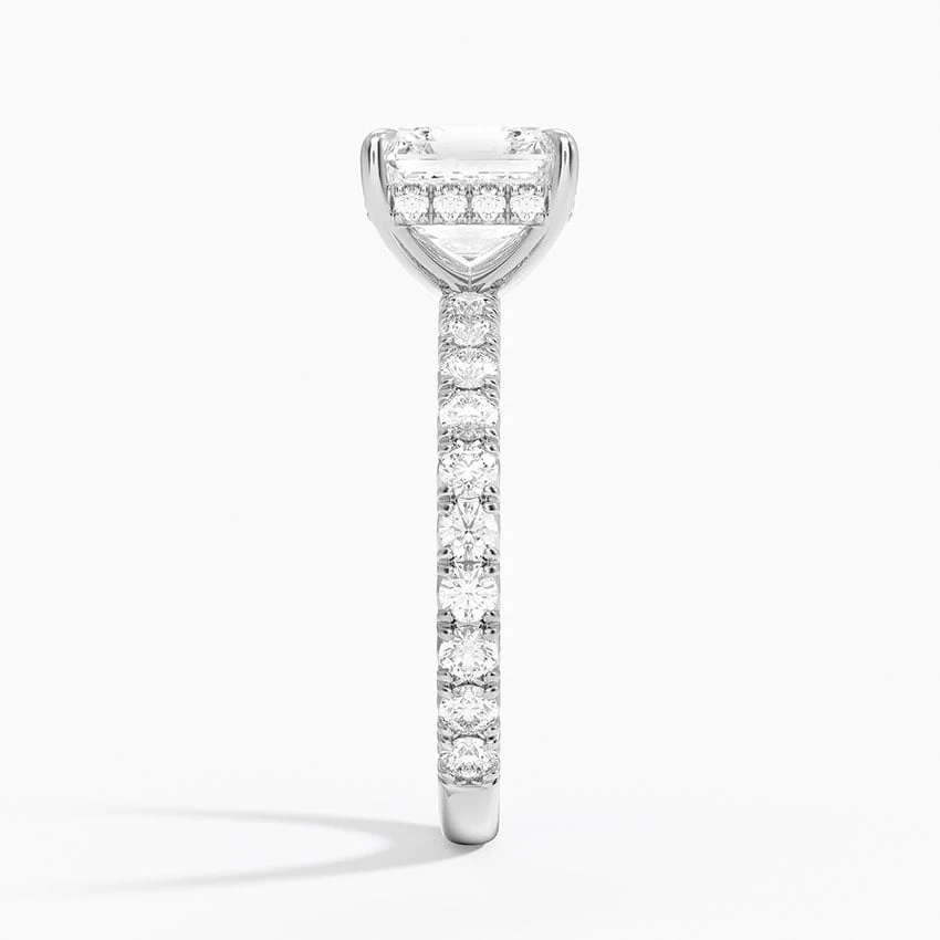 White gold asscher cut moissanite engagement ring direct side profile view showing hidden halo basket