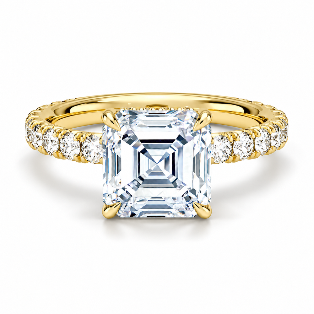 Yellow gold asscher cut moissanite engagement ring top view with French pave diamond band
