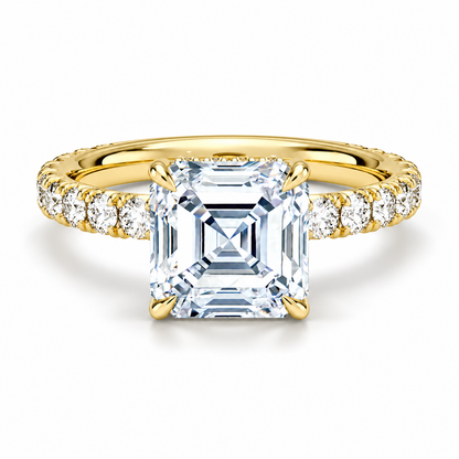 Yellow gold asscher cut moissanite engagement ring top view with French pave diamond band