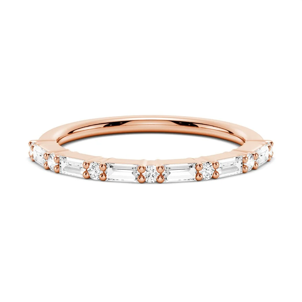 Front view of alternating baguette and round moissanite wedding band in rose gold