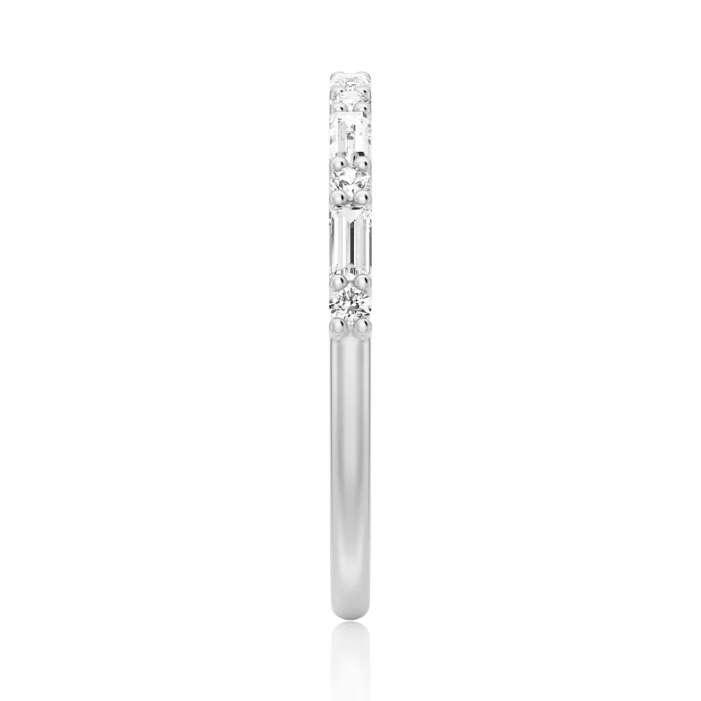Top view showing 2mm alternating baguette and round moissanite band in white gold