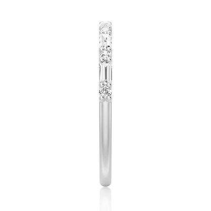 Top view showing 2mm alternating baguette and round moissanite band in white gold