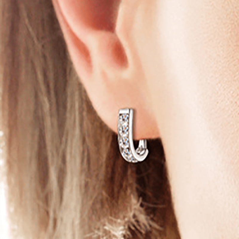 U-Shaped Channel Set Moissanite Huggie Hoop Earrings Worn on Ear in Sterling Silver S925 - Novelle Vow