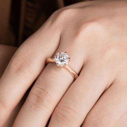 Classic 6 Prong Round Cut Moissanite Engagement Ring in Rose Gold on Hand Styling - Novelle Vow