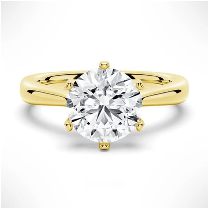 The Sophia Knife Edge 6 Prong Round Moissanite Engagement Ring in Yellow Gold