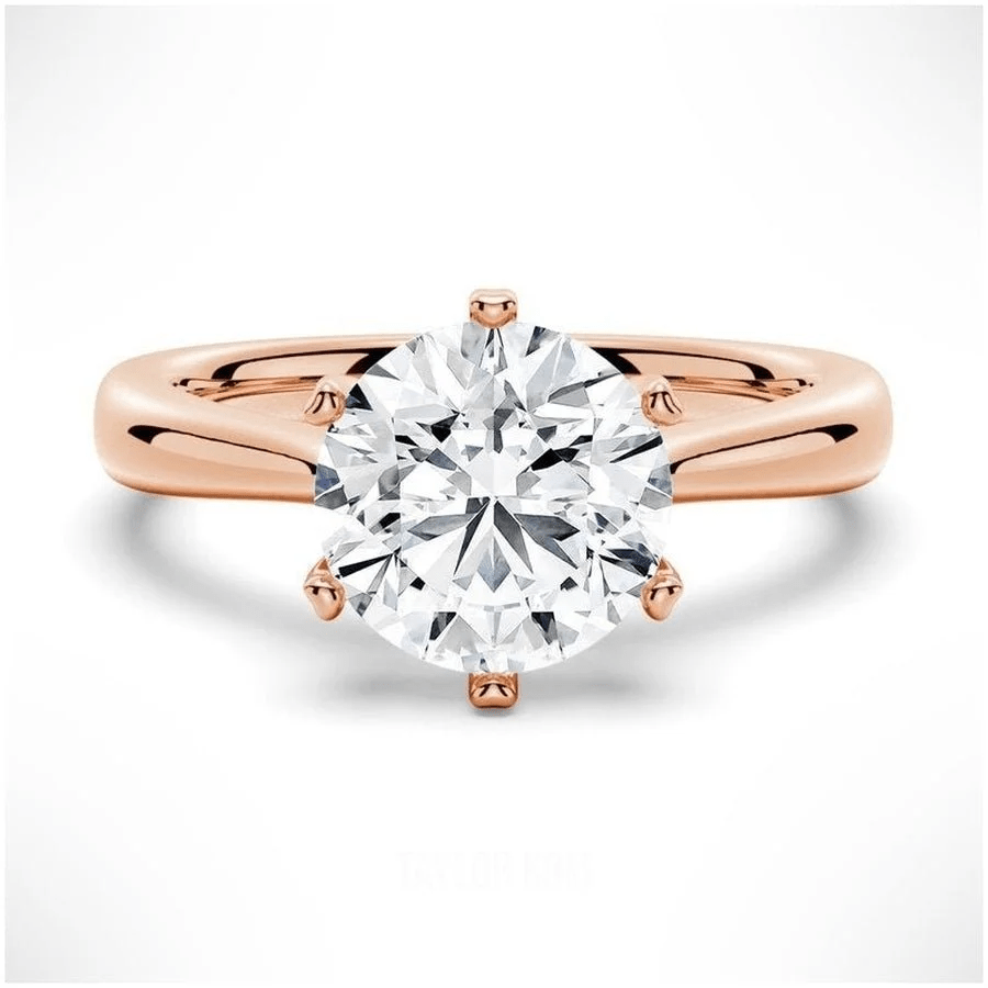 The Sophia Knife Edge 6 Prong Round Moissanite Engagement Ring in Rose Gold