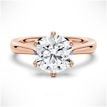 The Sophia Knife Edge 6 Prong Round Moissanite Engagement Ring in Rose Gold