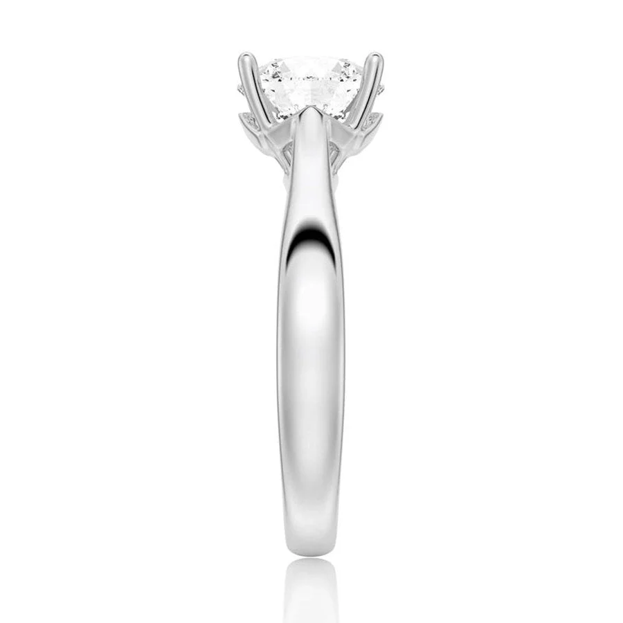 Classic Four-Prong Round Moissanite Solitaire Engagement Ring