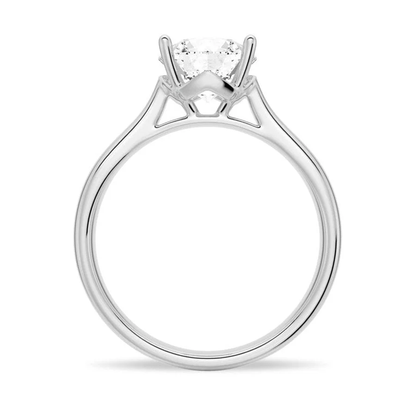 White gold four prong round moissanite solitaire ring side profile view