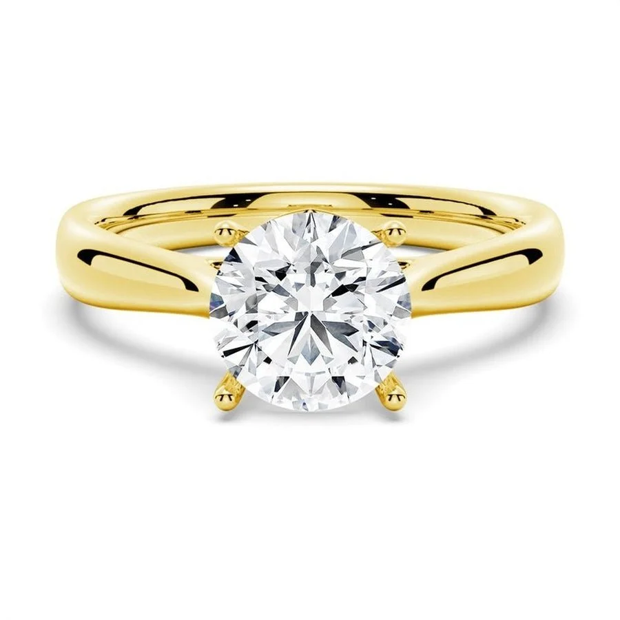 Yellow gold classic four prong round moissanite solitaire engagement ring top view
