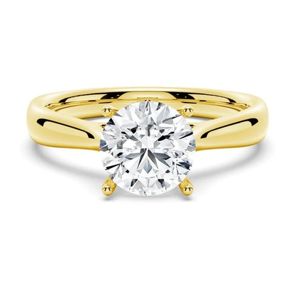 Yellow gold classic four prong round moissanite solitaire engagement ring top view