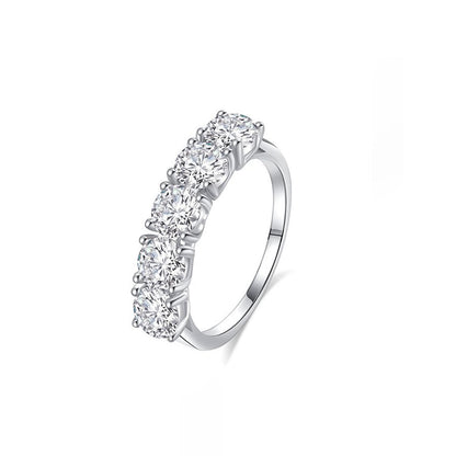 Angled profile view of Classic 5 Stone Round Moissanite Anniversary Wedding Band with Shared Prong Setting in White Gold