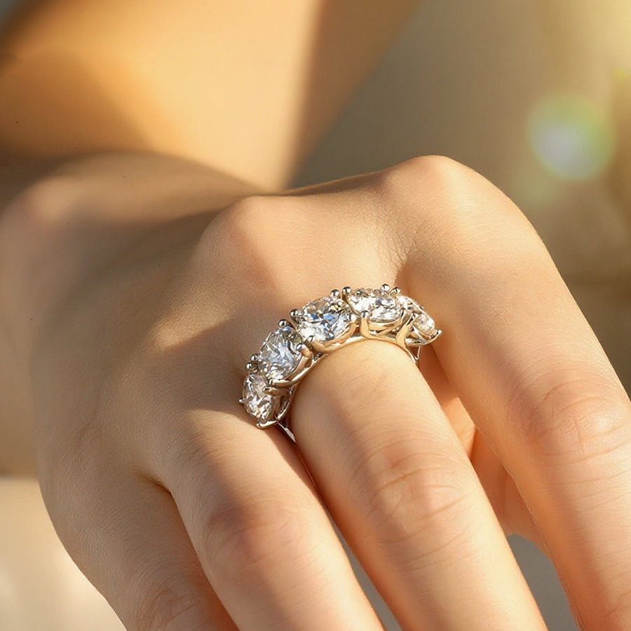 Classic 5 Stone Round Moissanite Anniversary Wedding Band with Shared Prong Setting in White Gold on hand styling 