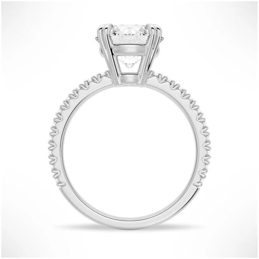 Profile view of Classic Round Moissanite Solitaire Engagement Ring 4 Prong showing basket setting details in White Gold - Novelle Vow