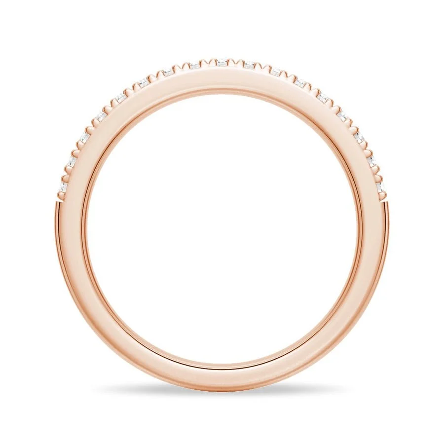 Side view showing round inner band profile of pave moissanite ring in rose gold color