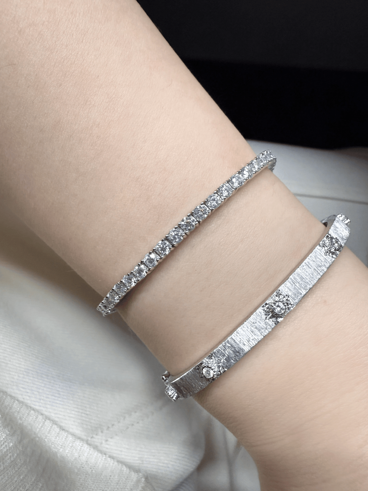 Classic Round Cut Moissanite Tennis Bracelet Worn on Wrist in White Gold - Novelle Vow