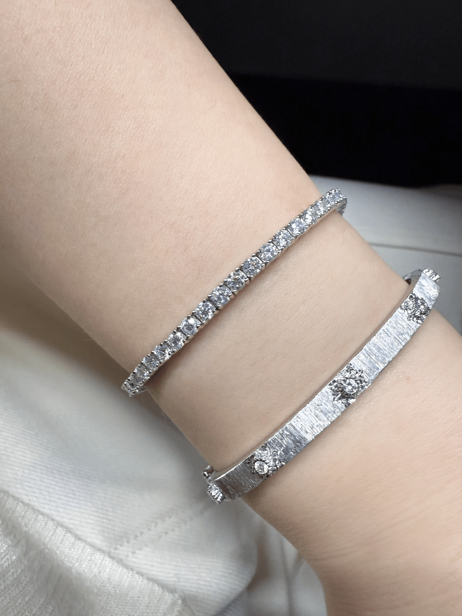 Classic Round Cut Moissanite Tennis Bracelet Worn on Wrist in White Gold - Novelle Vow