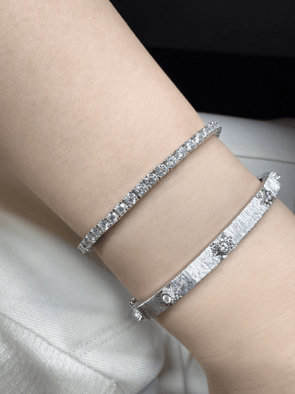 Classic Round Cut Moissanite Tennis Bracelet Worn on Wrist in White Gold - Novelle Vow
