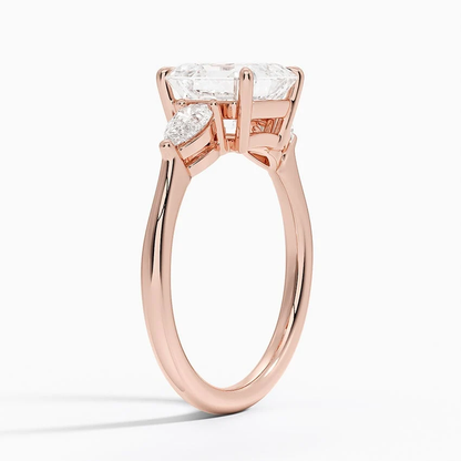 Rose gold classic three-stone asscher cut moissanite engagement ring 3/4 side view showing claw prong basket