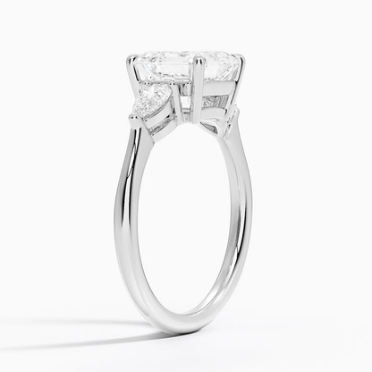 White gold classic three-stone asscher cut moissanite engagement ring 3/4 side view showing claw prong basket