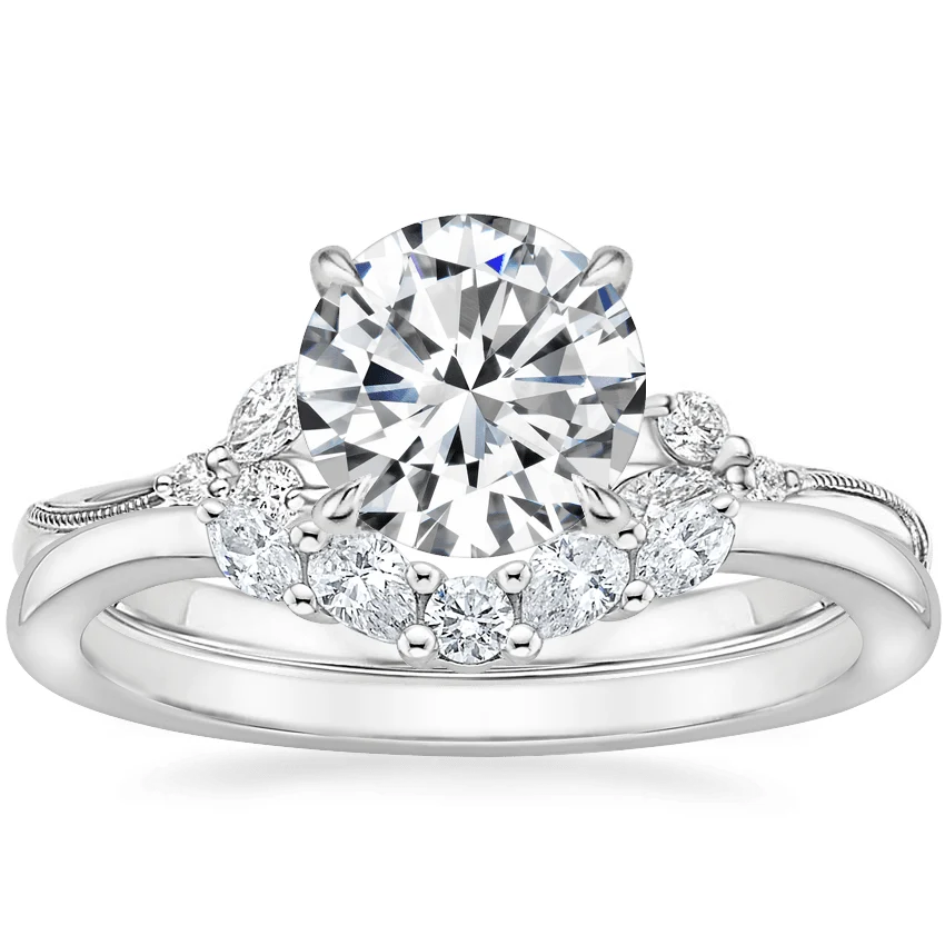 White gold contour moissanite wedding band stacked with vine round engagement ring