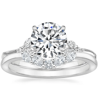 White gold contour moissanite wedding band stacked with vine round engagement ring