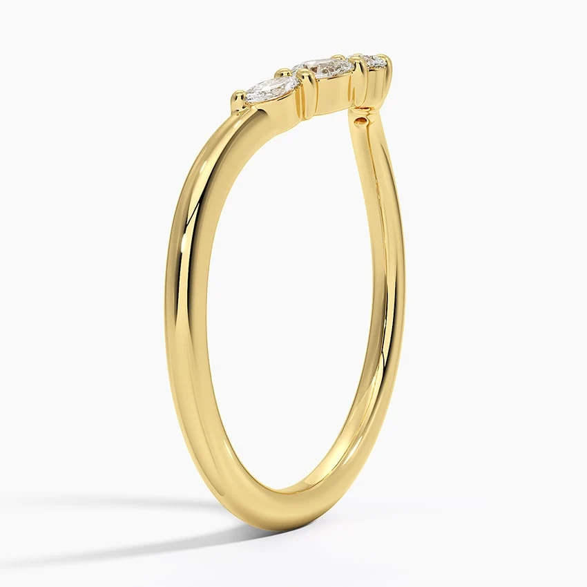 Side profile view of yellow gold contoured moissanite stacking ring