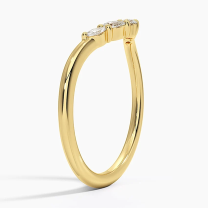 Side profile view of yellow gold contoured moissanite stacking ring