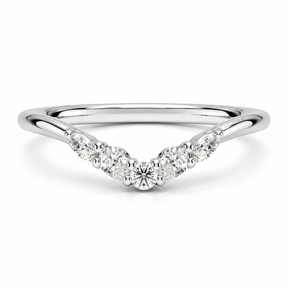 NOVELLE VOW front view of white gold curved wedding band with round pear and marquise moissanites