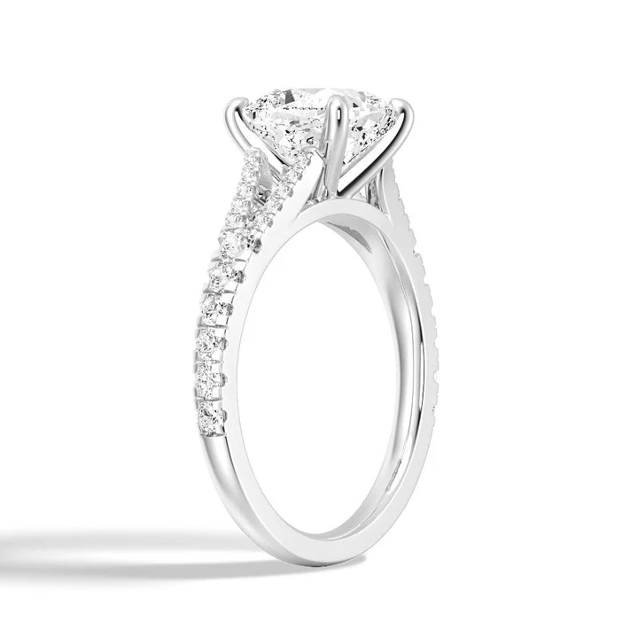 Angled profile view of Cushion Cut Moissanite Engagement Ring with Pave Split Shank Band in White Gold