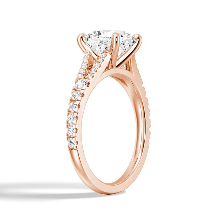 Angled profile view of Cushion Cut Moissanite Engagement Ring with Pave Split Shank Band in Rose Gold