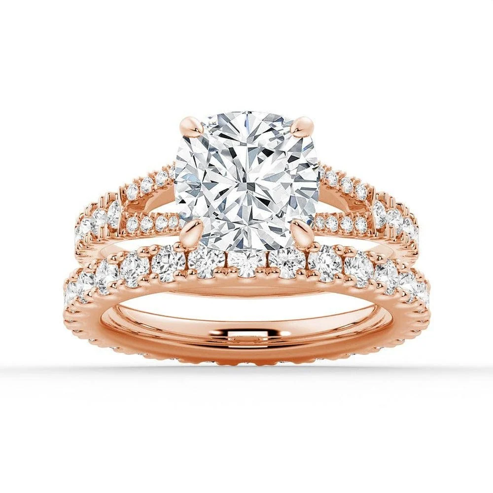 Rose gold cushion moissanite bridal set with pave engagement ring and matching wedding band