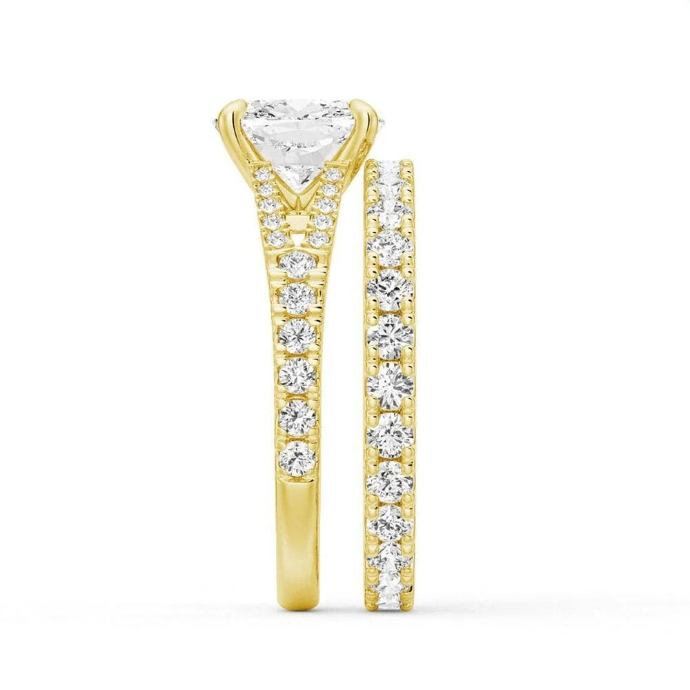 Yellow gold cushion moissanite bridal set side profile view showing stacked engagement ring and pave band