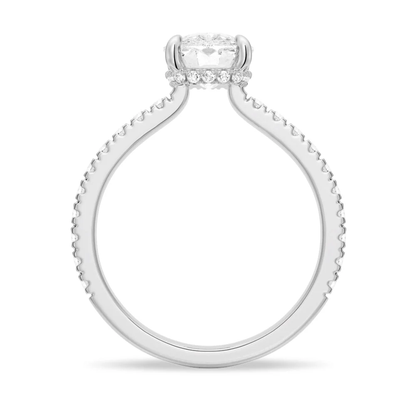 White gold cushion cut moissanite engagement ring direct side profile view showing hidden halo collar and pave band