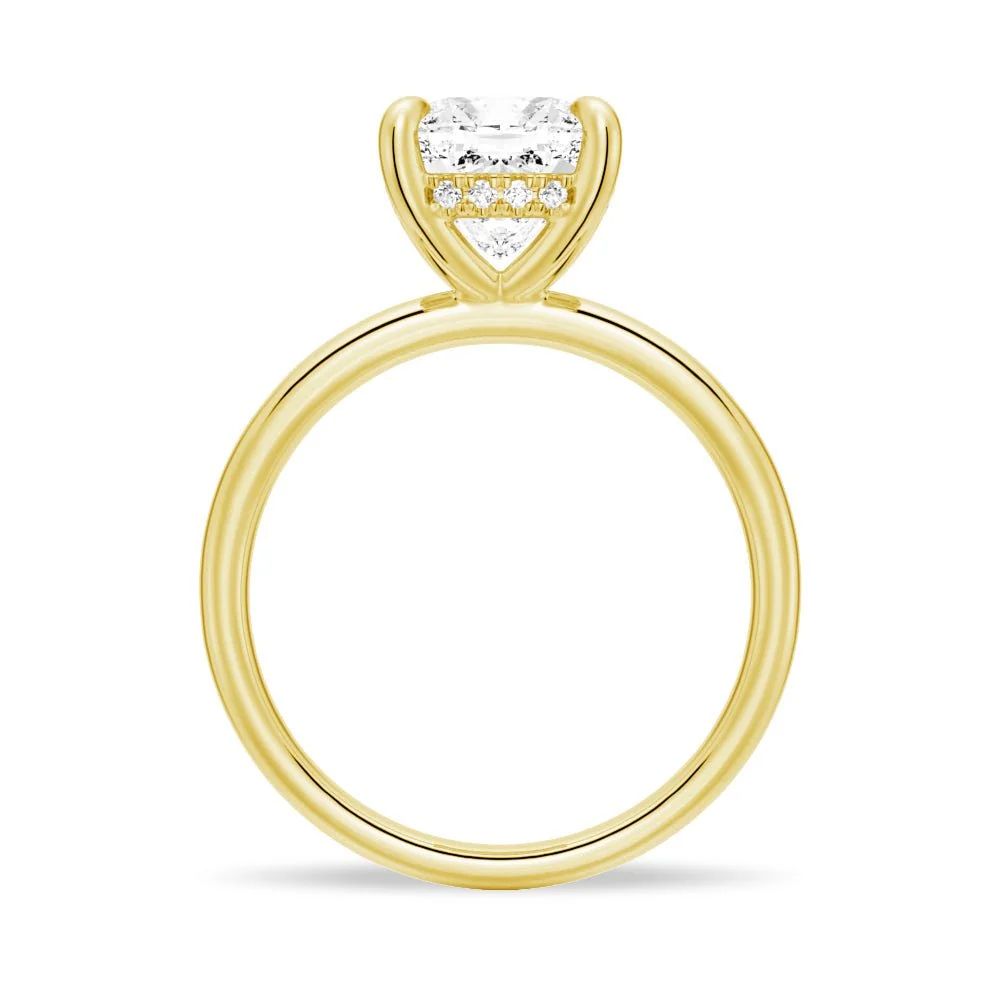 Yellow gold cushion cut moissanite engagement ring side profile view showing hidden halo basket