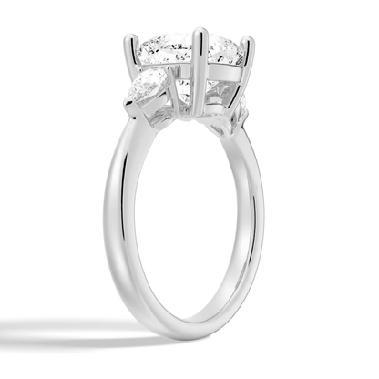 White gold cushion cut moissanite engagement ring 3/4 side low angle perspective view showing plain band