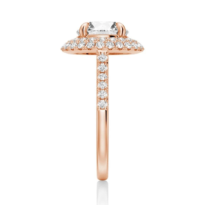 Rose gold double halo round moissanite ring side view showing pave band details